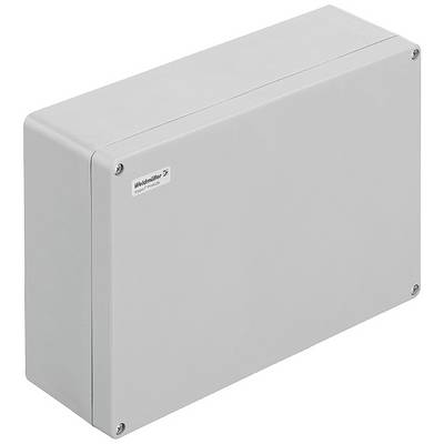 A rectangular grey fuse box with screws at the corners, marked with a small label in the top left.