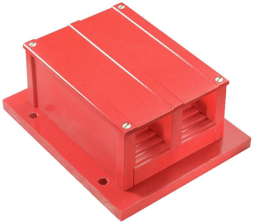 Red plastic roof covering on a rectangular base, a typical element for internal cable protection installations in industrial environments.