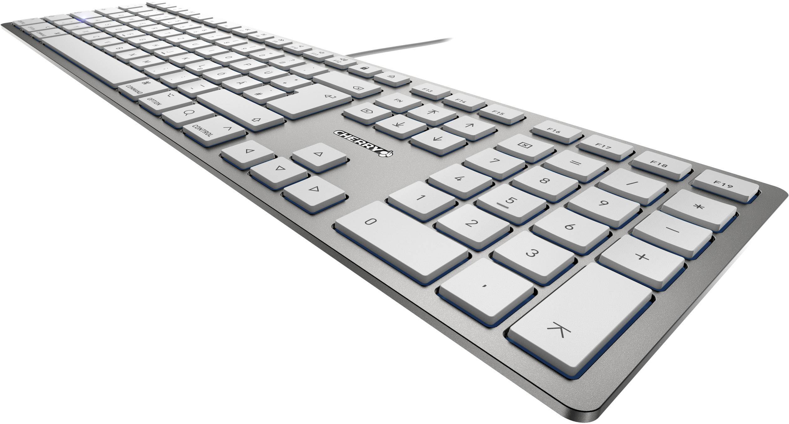 A slim, silver computer keyboard with white, flat keys and a numeric keypad on the right-hand side.