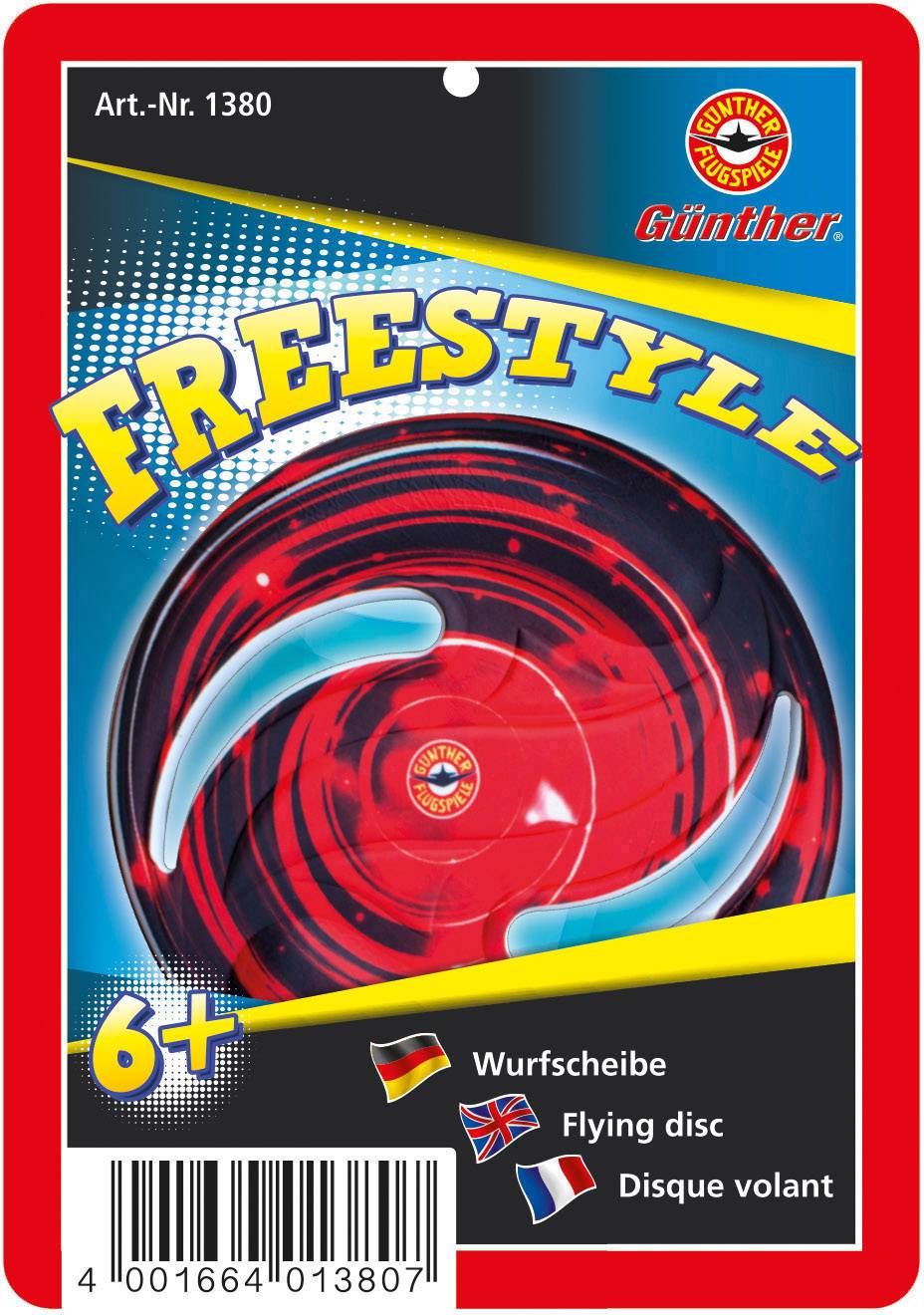Red and black frisbee with 'Freestyle' printed on it, suitable for ages 6 and up. Packaging includes German, British and French text.