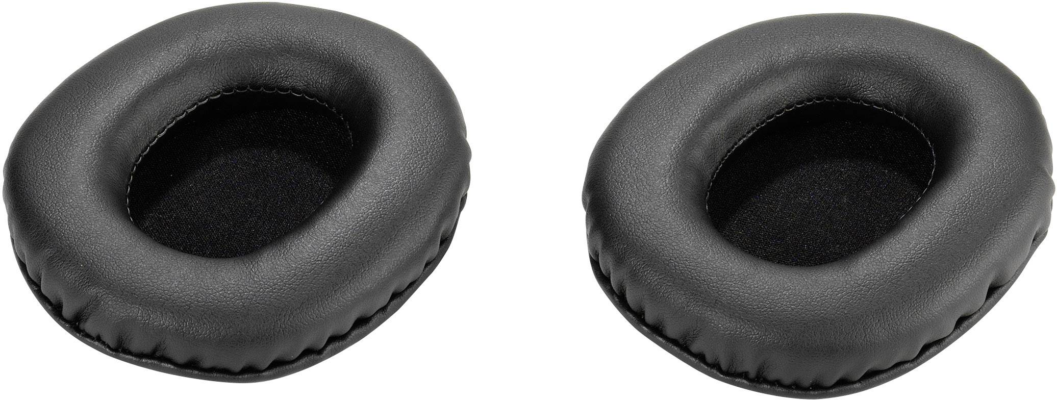 Two black oval ear cushions, lying side by side, made of soft synthetic leather with a seam running centrally along the edge.