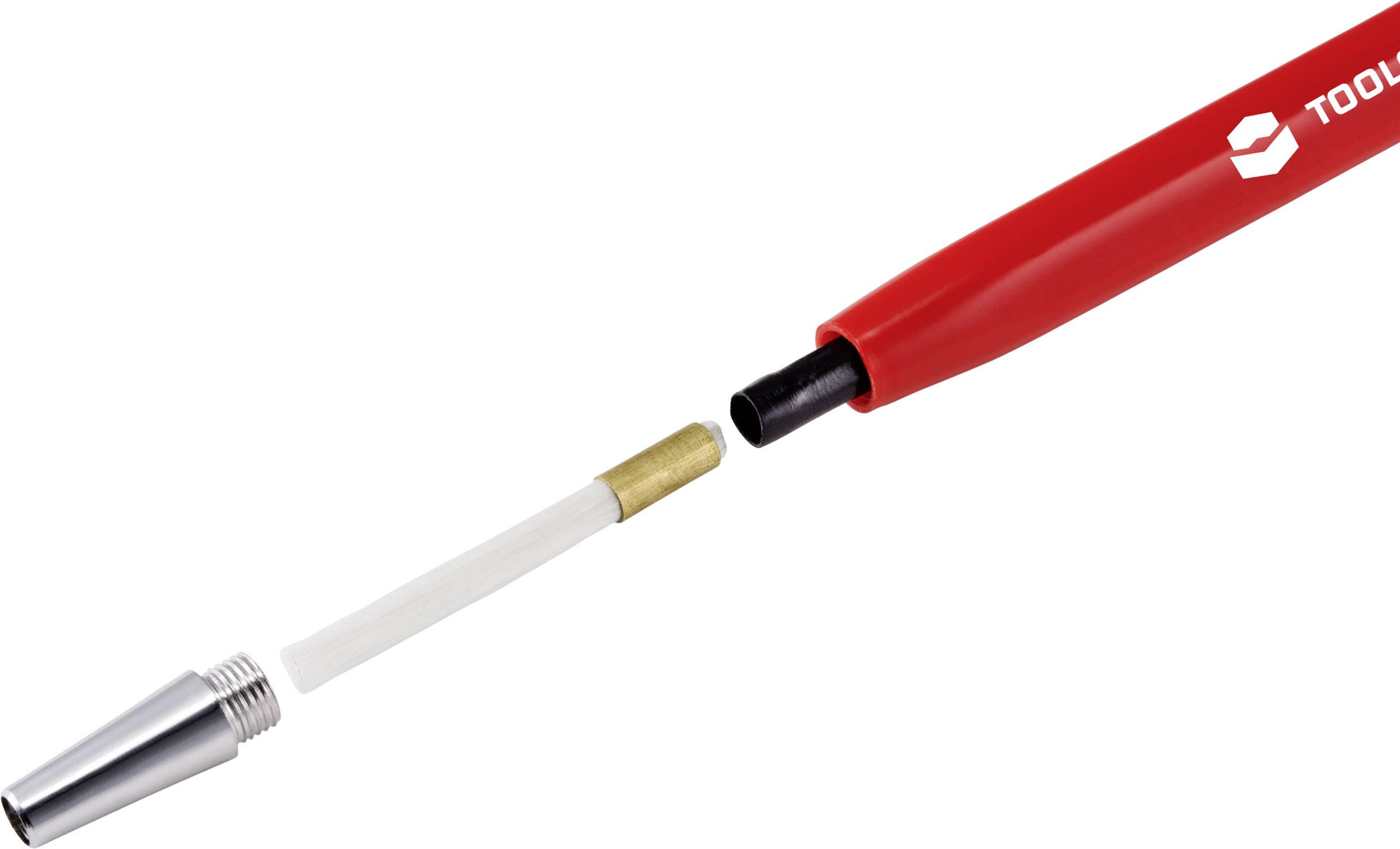 Disassembled red ballpoint pen with cap, casing, refill, and tip.