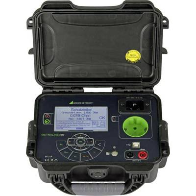 A portable testing device in a robust casing, displaying a reading of '0076 Ohm' on its screen, surrounded by control buttons and sockets.