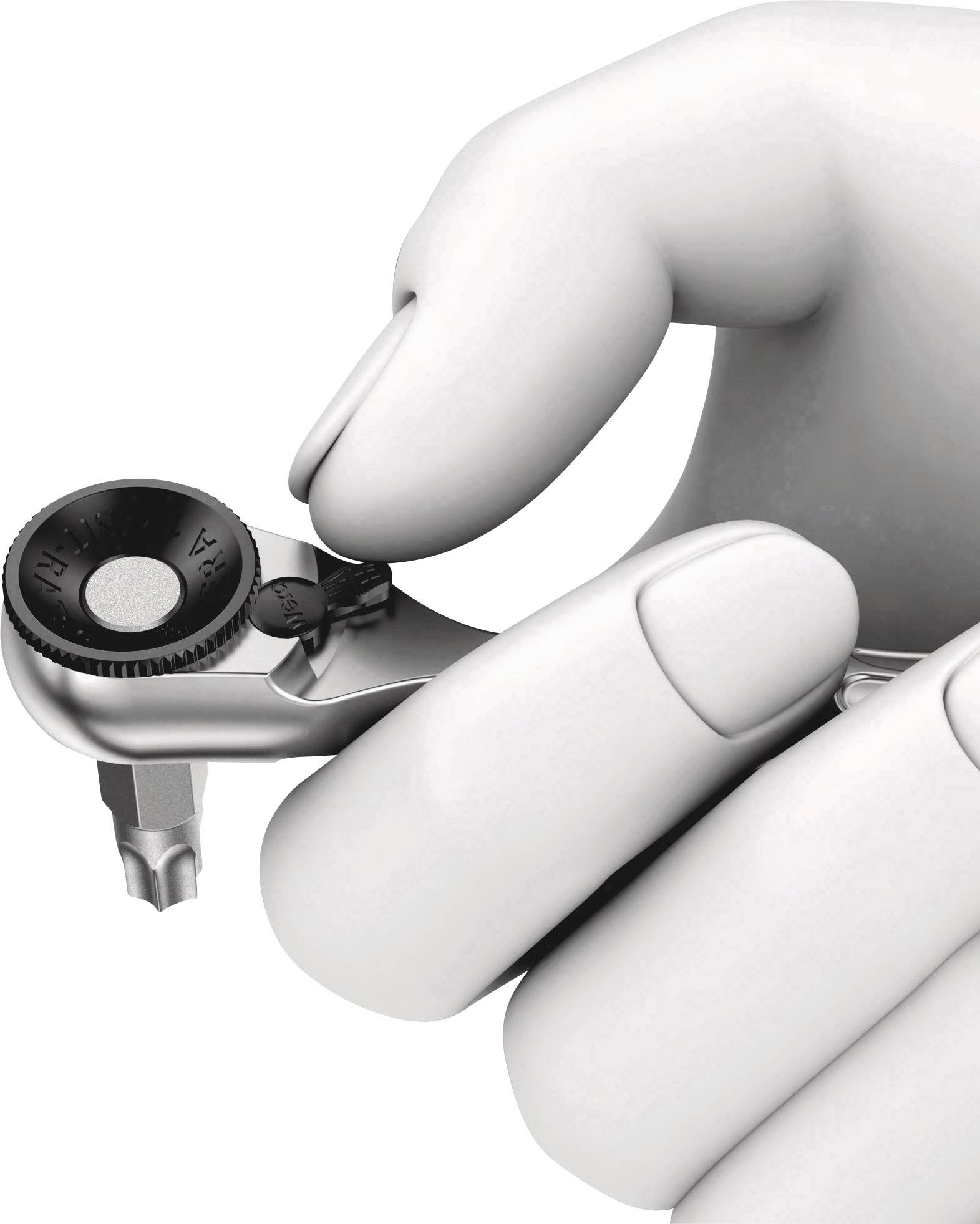 A hand is holding a small adjustable spanner, which is used for precise work in confined spaces.