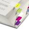 An open book with colourful sticky notes on the pages, serving as tabs. One note is labelled 'Definition'.
