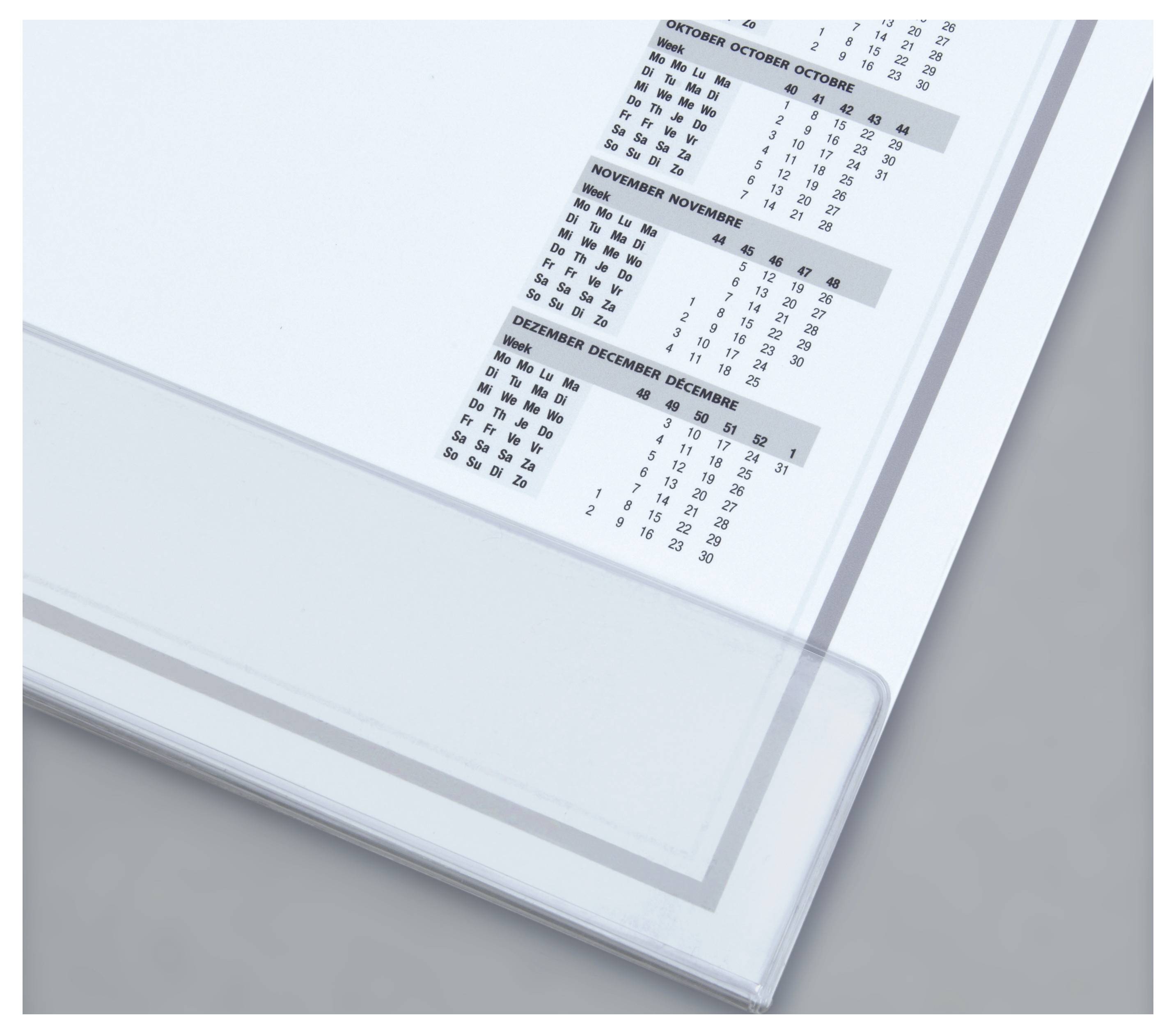 A section of a desk pad with a calendar overview for October, November and December. Weekly days are arranged in rows.