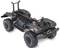 A remote-controlled model car chassis with large, chunky tyres and visible electronics, without bodywork.