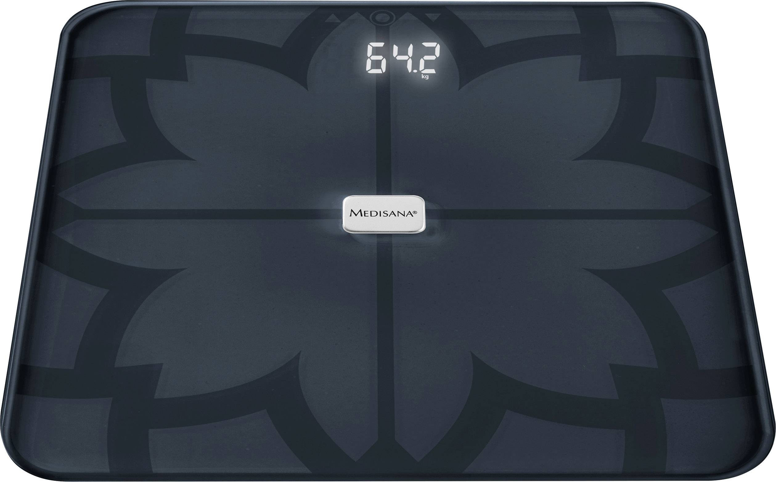 Digital bathroom scale shows 64.2 kg.