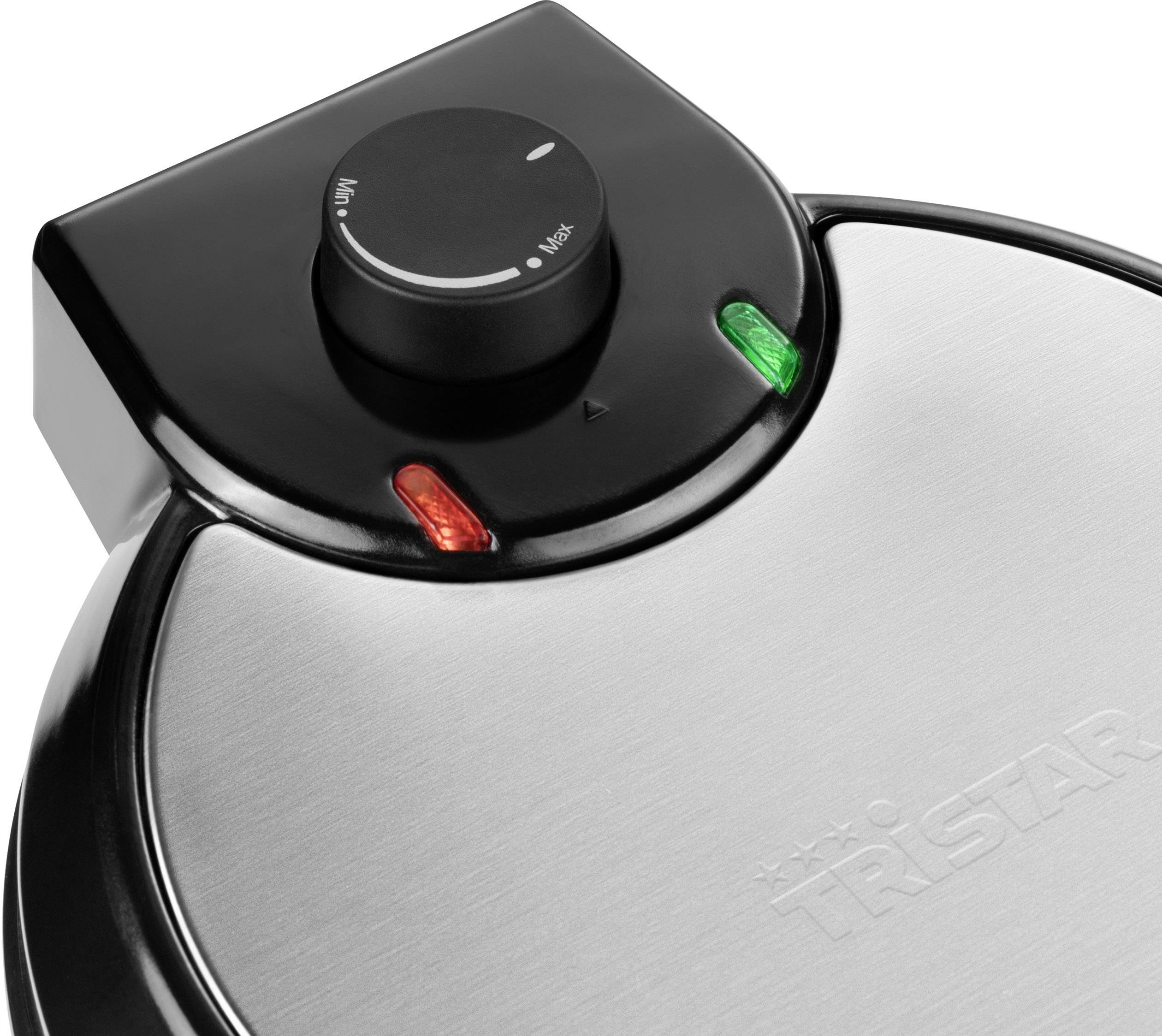 'Close-up of an electric kitchen appliance with temperature control and indicator lights in red and green, Tristar brand.'