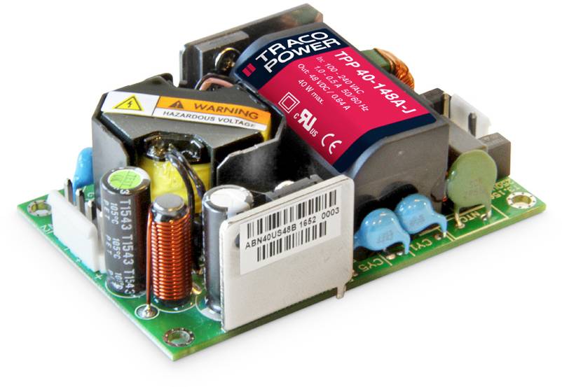 Electronic power supply module with 'TRACO POWER' label. Components and warning notices visible. For electrical and electronic applications.