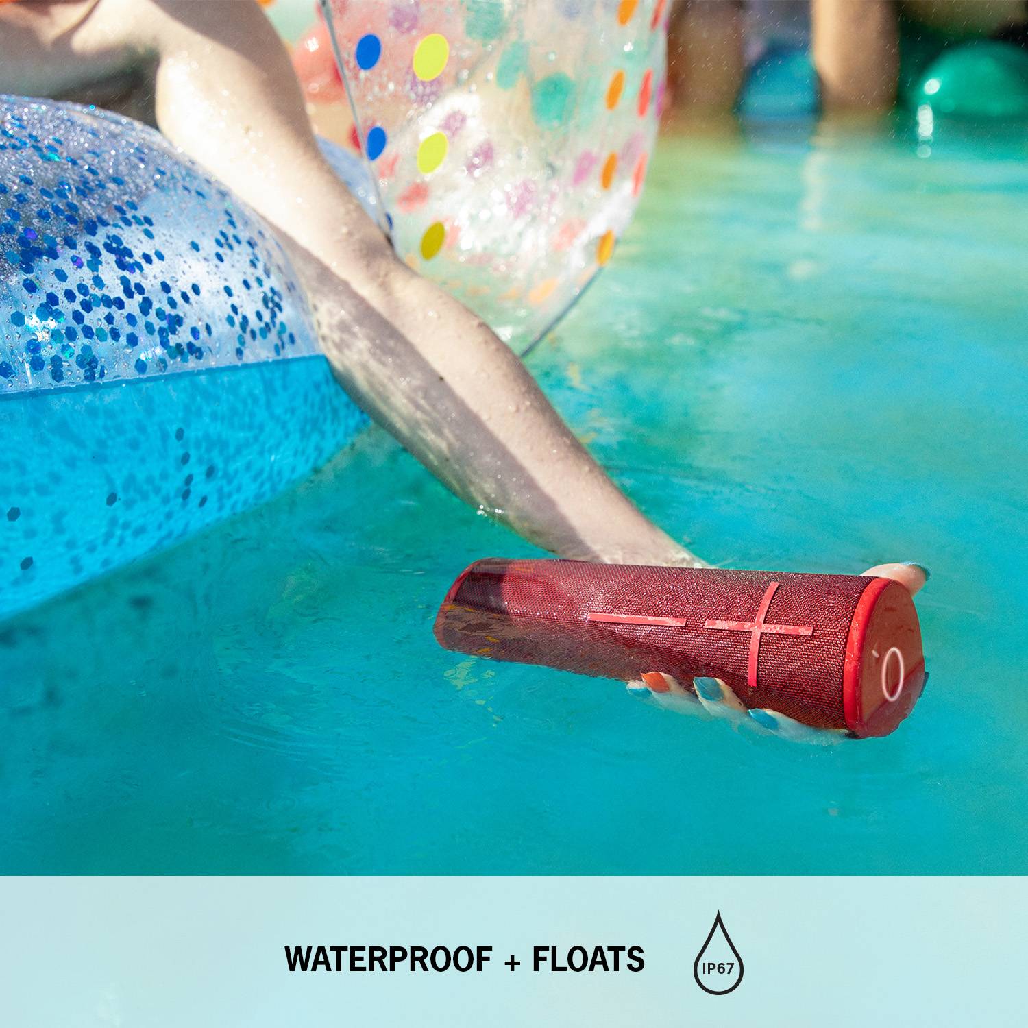 A red Bluetooth speaker is floating in the water next to a blue inflatable pool chair. Text: 'Completely waterproof IP67'.