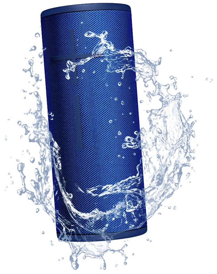 A blue, cylindrical speaker surrounded by splashing water, demonstrating its waterproofing.