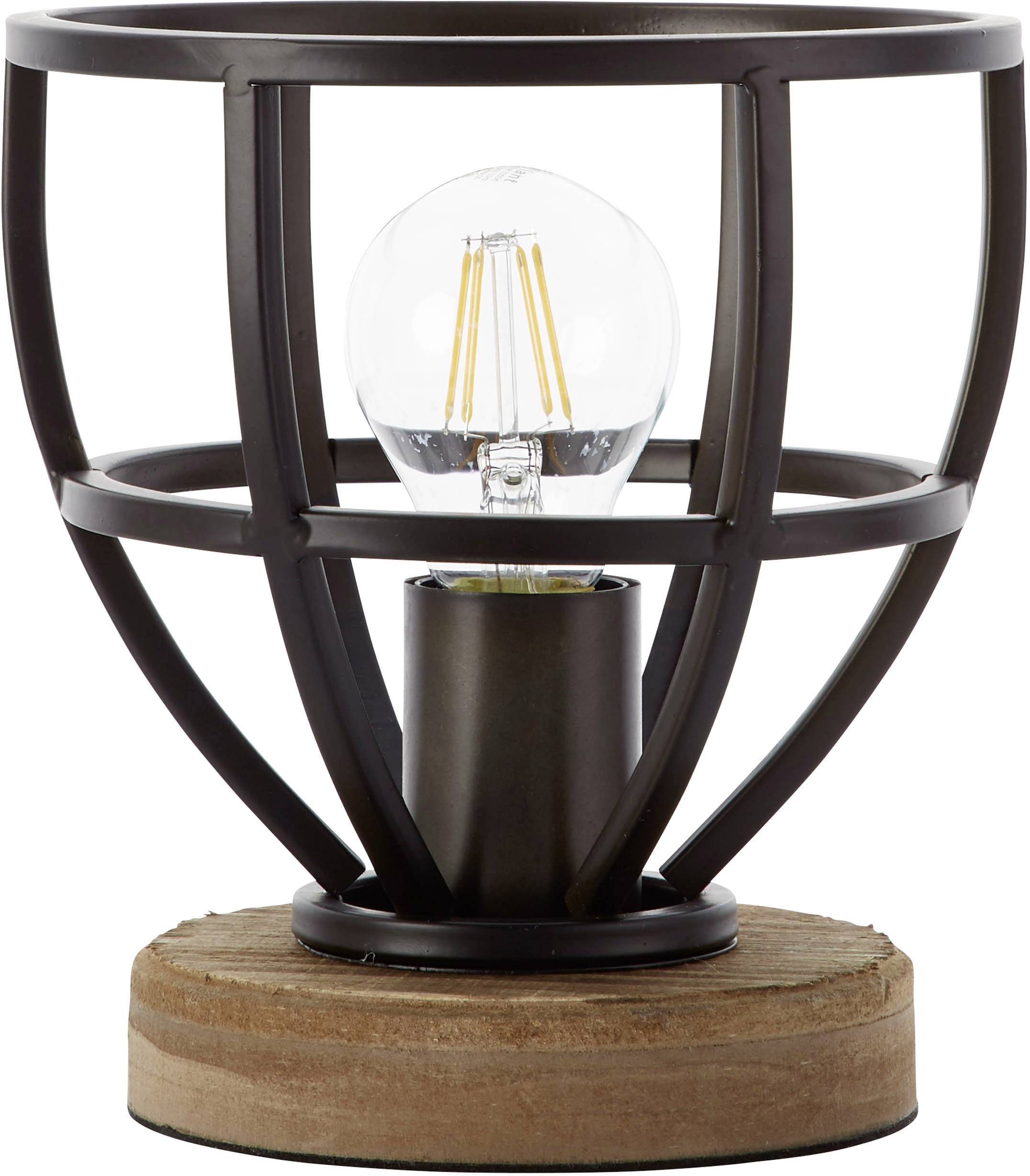 A table lamp with an open metal cage design and exposed bulb, sitting on a round wooden base.