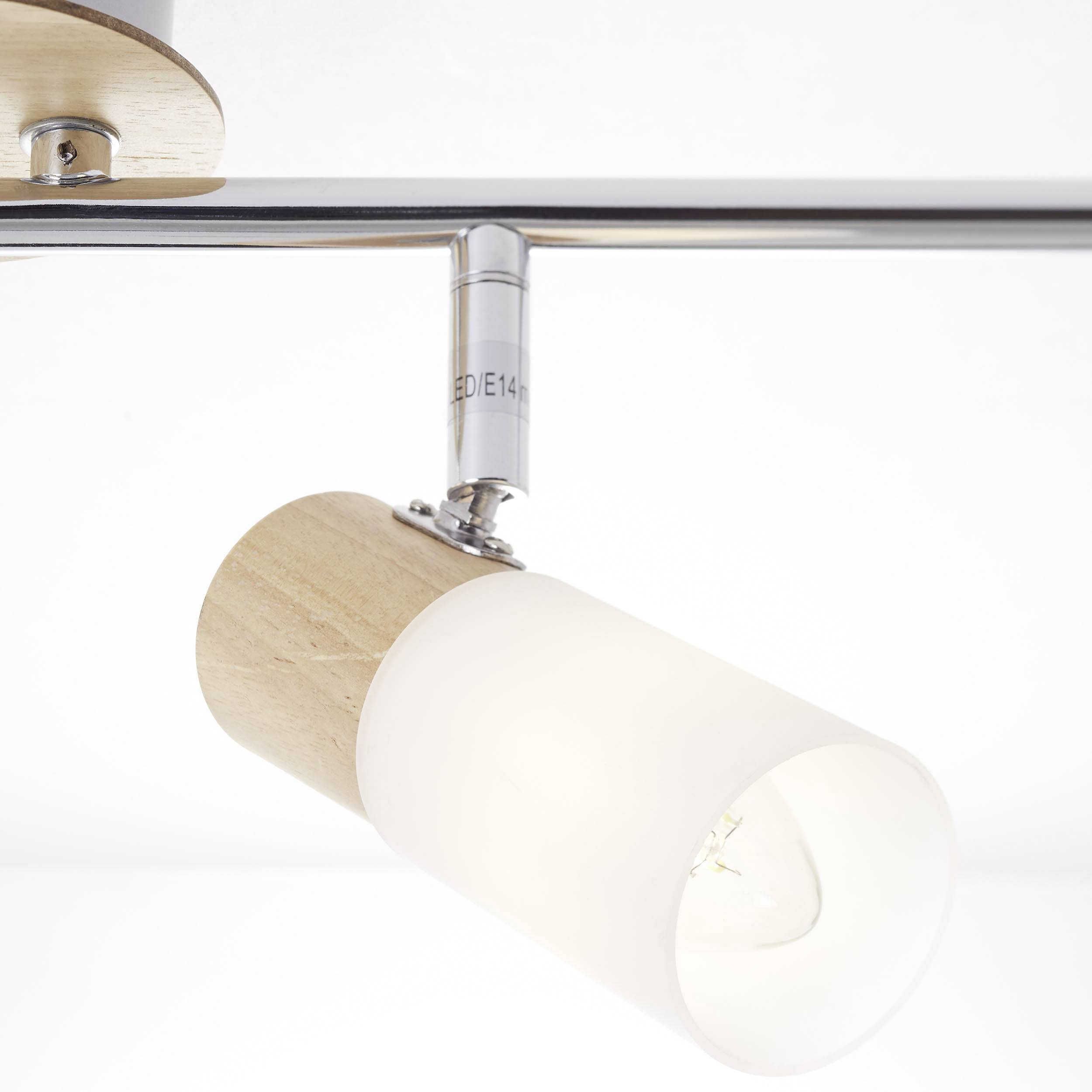 A contemporary ceiling light with a cylindrical, white lamp shade and wooden details, mounted on a metal rod.