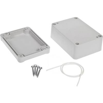 A grey two-part electronic enclosure, accompanied by screws and a cable tie, on a white background.
