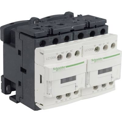 A contactor from Schneider Electric, LC1D09 model, with two white modules and green labelling. Electrical switching device.