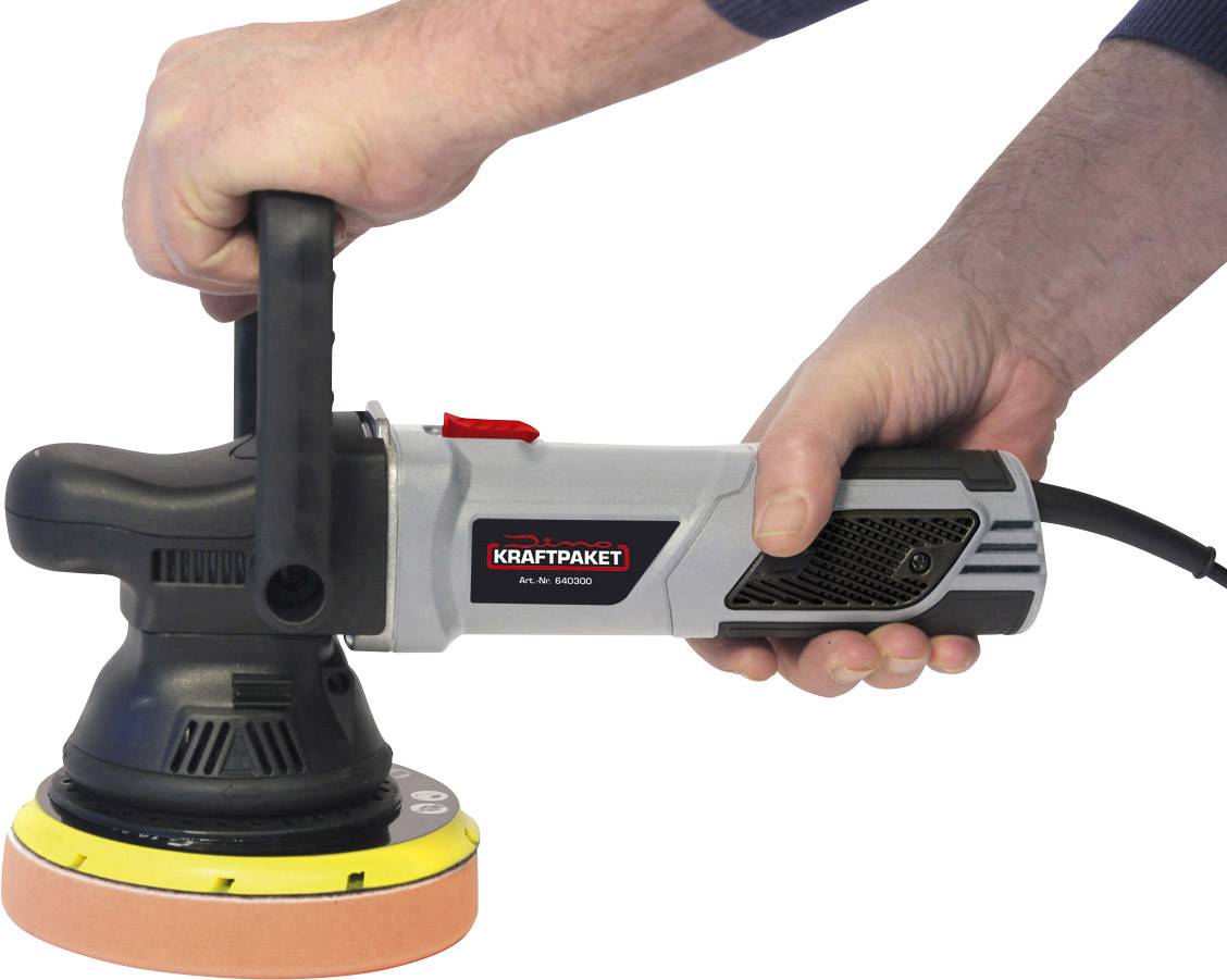 Two hands are holding an electric polishing machine with an orange polishing pad and black handle.