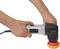 A person is holding an electric polishing machine with an orange polishing pad. The machine is suitable for surface treatment.