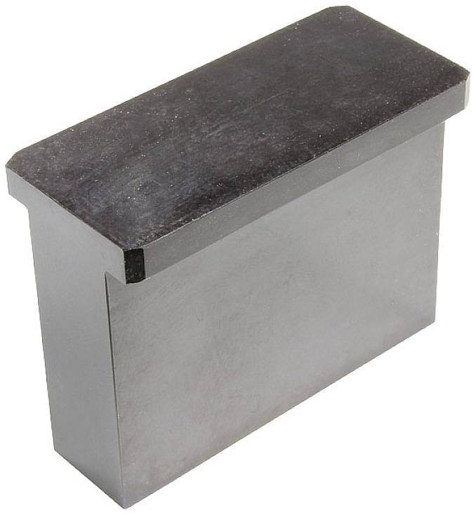 Metal block with a flat, rectangular head, used as a component or tool part in technical applications.
