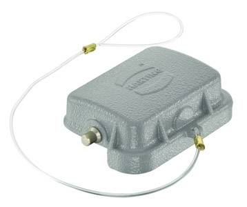 A rectangular, grey device with a textured casing, to which a white cable with metal connectors is attached.