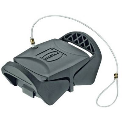 A black plastic lid with a wire rope attached to it. The object has a handle and a recess with a pattern.