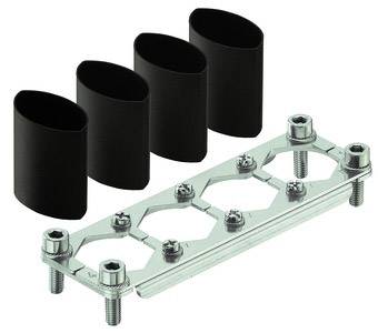 Metallic mounting bracket with four black, oval rubber components, suitable for securing pipes or cables.