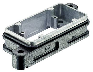 Metal frame with a rectangular opening and screw holes at the corners, possibly part of an industrial machine component.