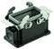 Metallic industrial connector housing in a rectangular form with side lever locks and visible internal compartment.