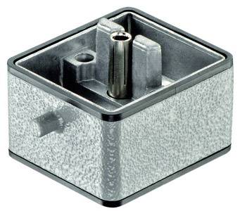 A square metal adapter with a central, protruding socket designed for connecting audio cables.