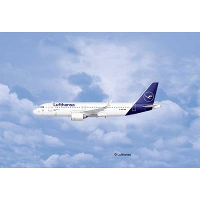 A Lufthansa aircraft flies in a blue sky with white clouds. The aircraft is white with a blue tail and logo.