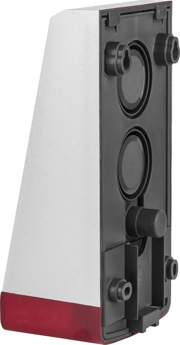 A trapezoidal, multi-coloured plastic component with several round indentations, likely part of a technical device.