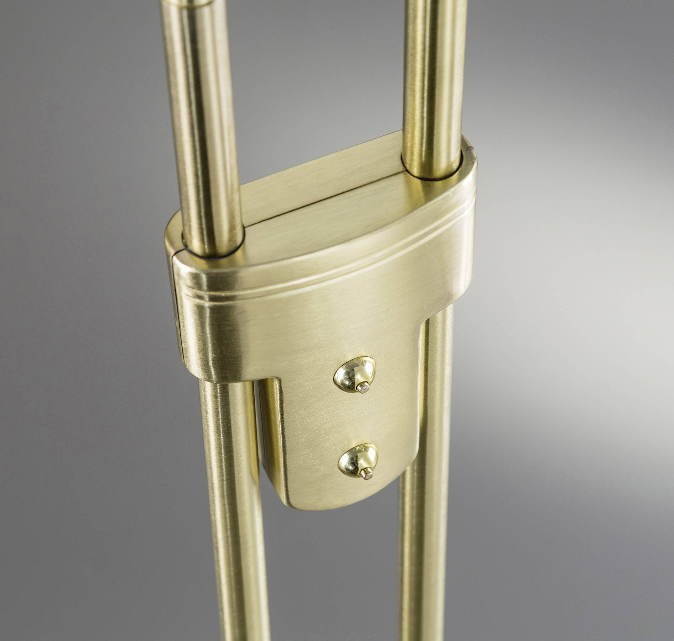 A close-up of a gold-coloured, metallic connector with two vertical bars, suitable for a minimalist design.