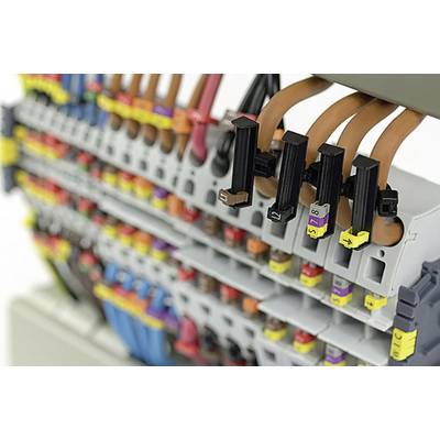 'Close-up of a terminal block with multiple cables and connectors in various colours.'