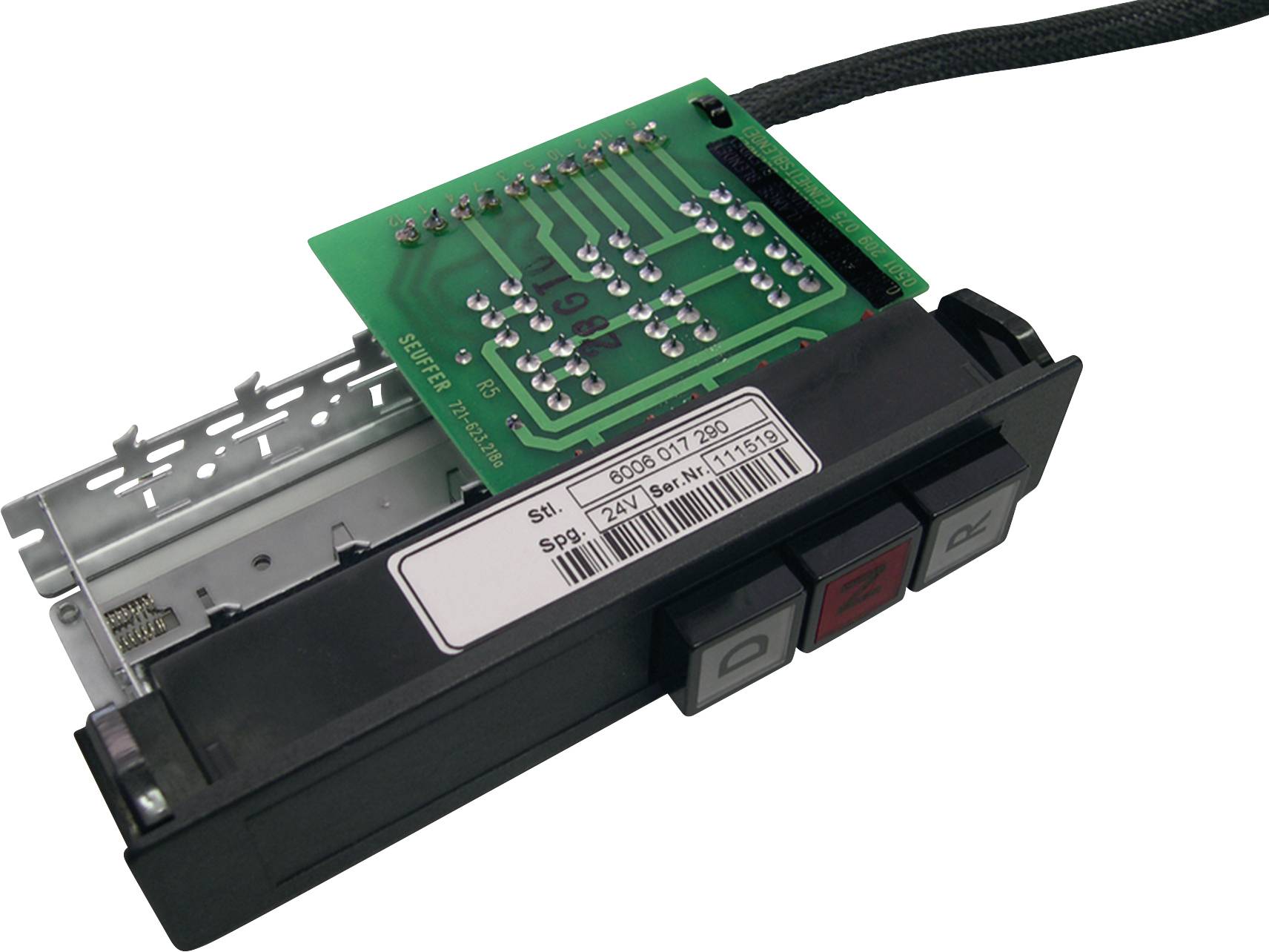 An electronic device with a circuit board and a casing that shows switches and a barcode label.