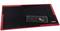 Large, red and black mouse pad with keyboard and mouse on it. The mouse pad bears the inscription 'Nitro Concepts'.