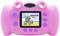 Pink toy camera with display shows a beach scene with a koala. Buttons on the side for operation.
