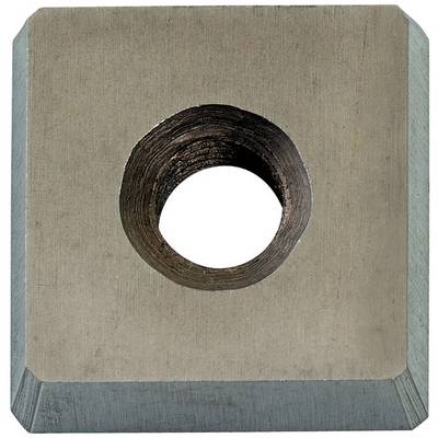 Close-up of a square metal plate with a central circular hole, likely a machined washer or spacer.