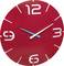 Red wall clock with white Arabic numerals at 12, 3, 6, 9. Hands pointing to approximately 12:04.