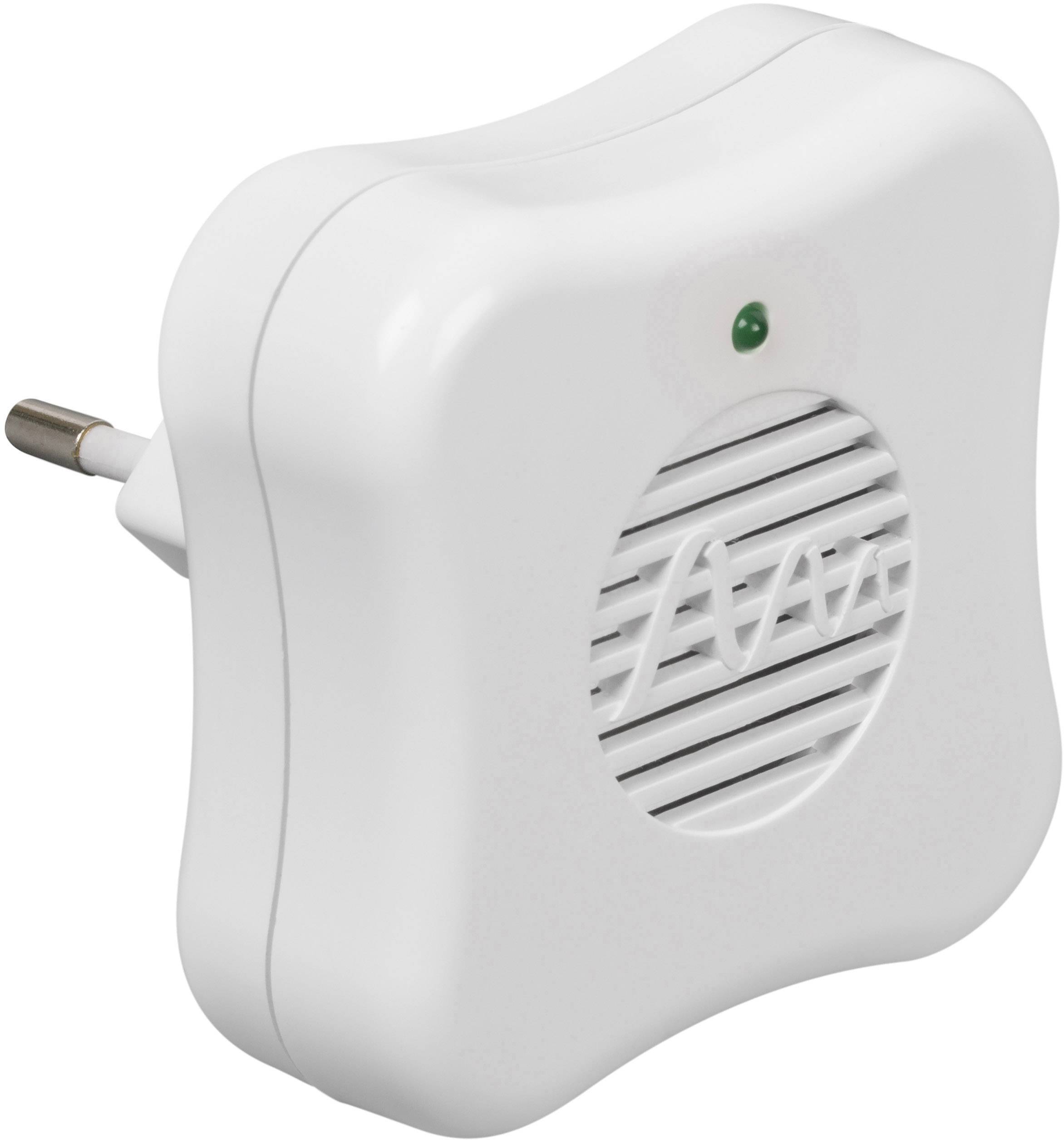 A white plug socket with a green light and a ventilation grille in the centre.