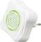 A white, flower-shaped plug with a green light is illuminated; it is plugged into a socket and resembles an air freshener.