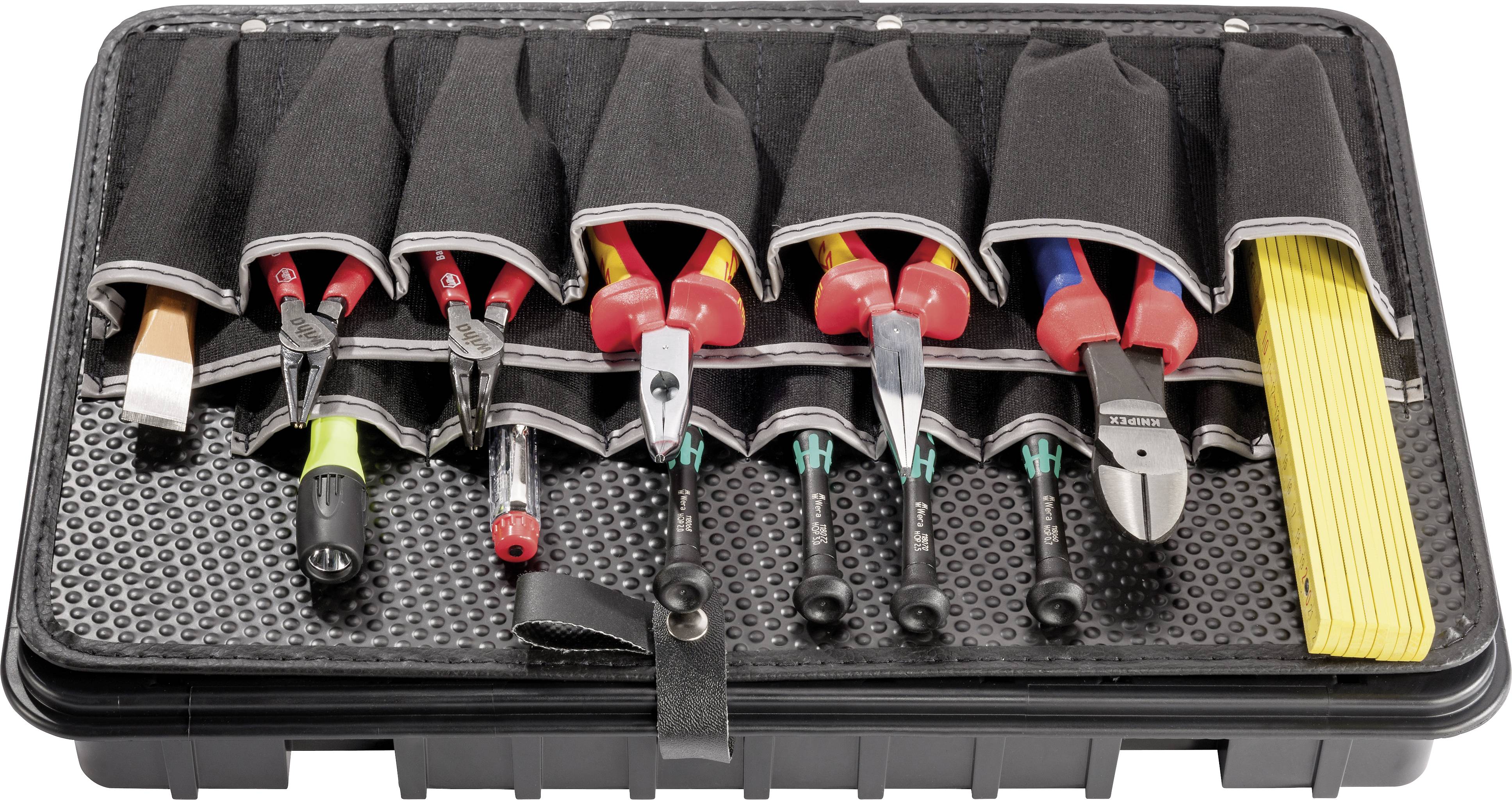 Tool bag with various hand tools, including pliers, screwdrivers and a folding ruler, neatly arranged.