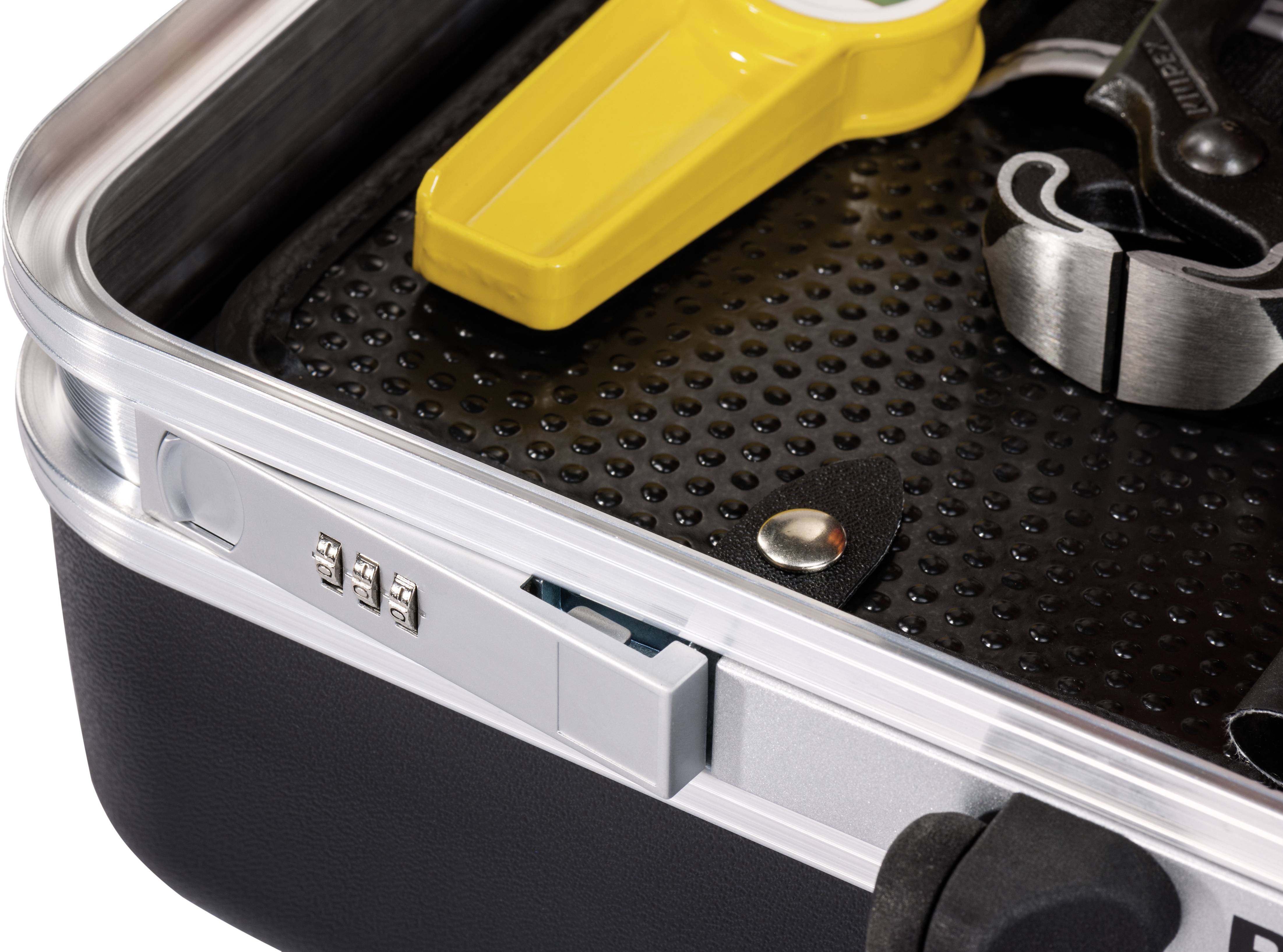 Black hard-shell suitcase with combination lock, open. Interior view shows a yellow tool and a silver, metallic pliers.
