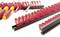 Several red plastic holders on black rails, securely organising tools such as screwdrivers.
