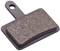 Metal brake pad plate, rectangular in shape, with a rough surface. Used in bicycle brake systems.