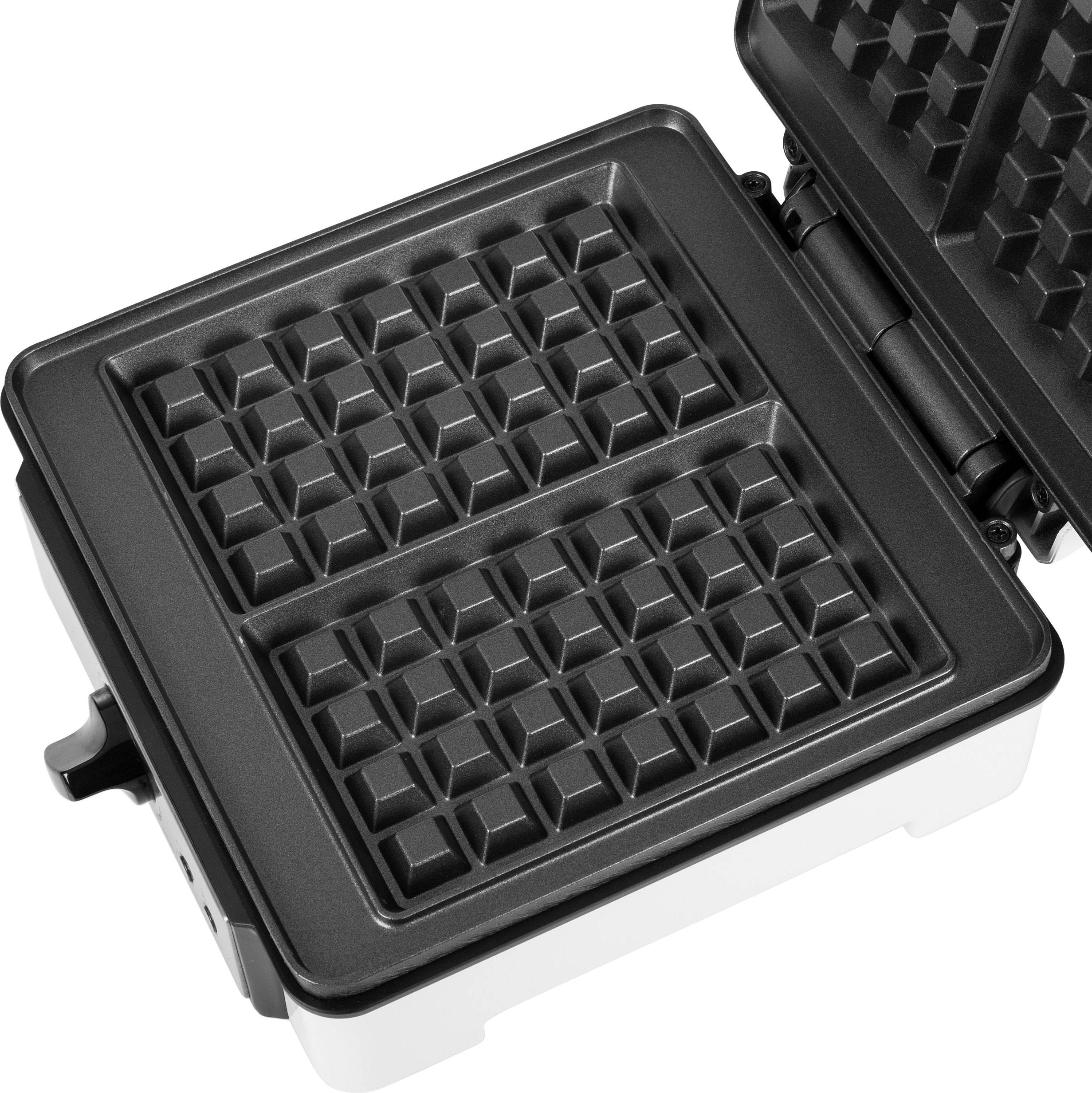 Waffle iron, open. Black non-stick surface with a square pattern, suitable for baking waffles.