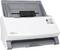 A white, compact document scanner by Plustek with a document feeder on top and an output tray at the bottom.