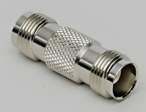 'Coaxial plug with a ribbed central section and two straight ends, on a light grey background.'