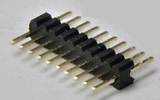 A black pencil header connector with twelve golden pins, lying horizontally on a grey surface.
