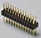 A row of golden pin strips, horizontally aligned, on a grey background.