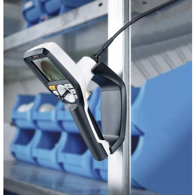Handheld device with display, mounted on a shelf, surrounded by blue plastic containers. Likely used for measurement or inspection.